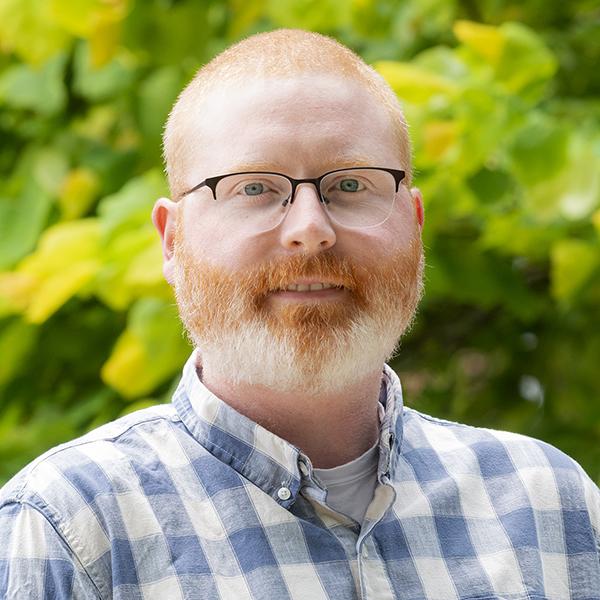 Portrait of Chris Harlen, LCSW-C (he/him)